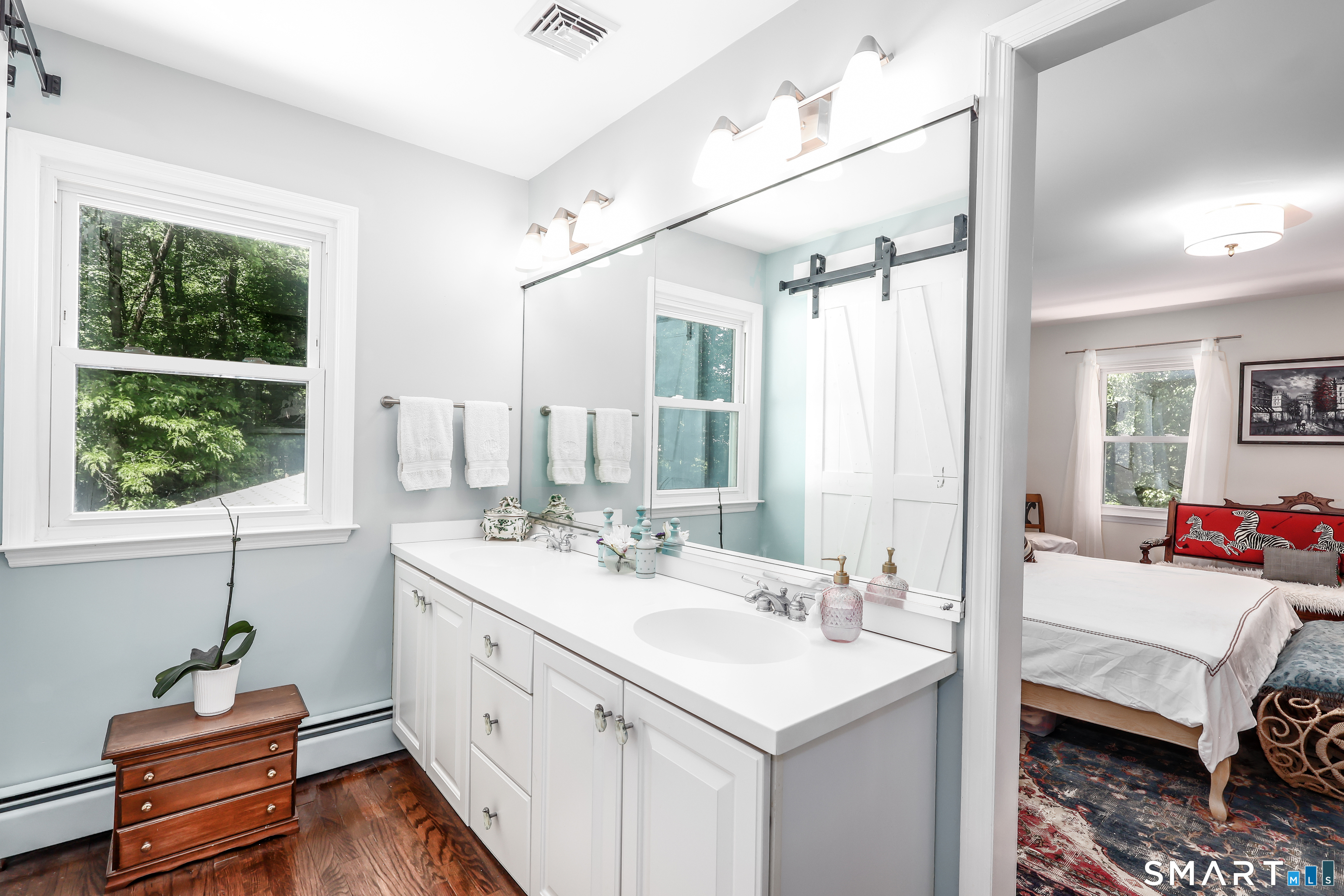 23 Old Green Road Newtown, CT 06482 - Photo 21 of 36 a spacious bathroom with a sink double vanity and a mirror