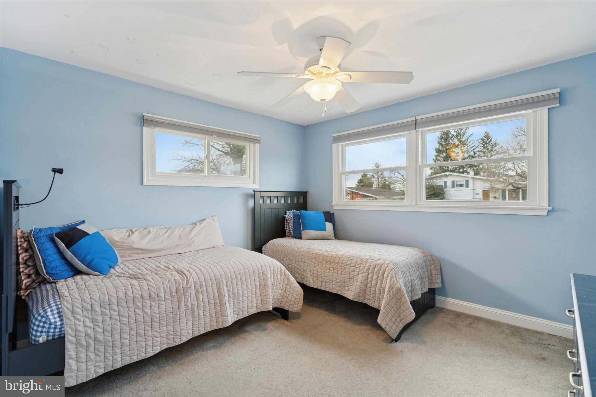 415 Milford Road Broomall, PA 19008 - Photo 14 of 29 a bedroom with a bed and a painting on the wall