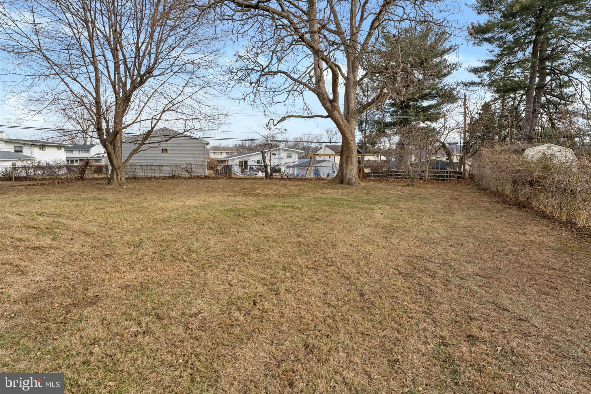 415 Milford Road Broomall, PA 19008 - Photo 24 of 29 a tall house with trees in front of it