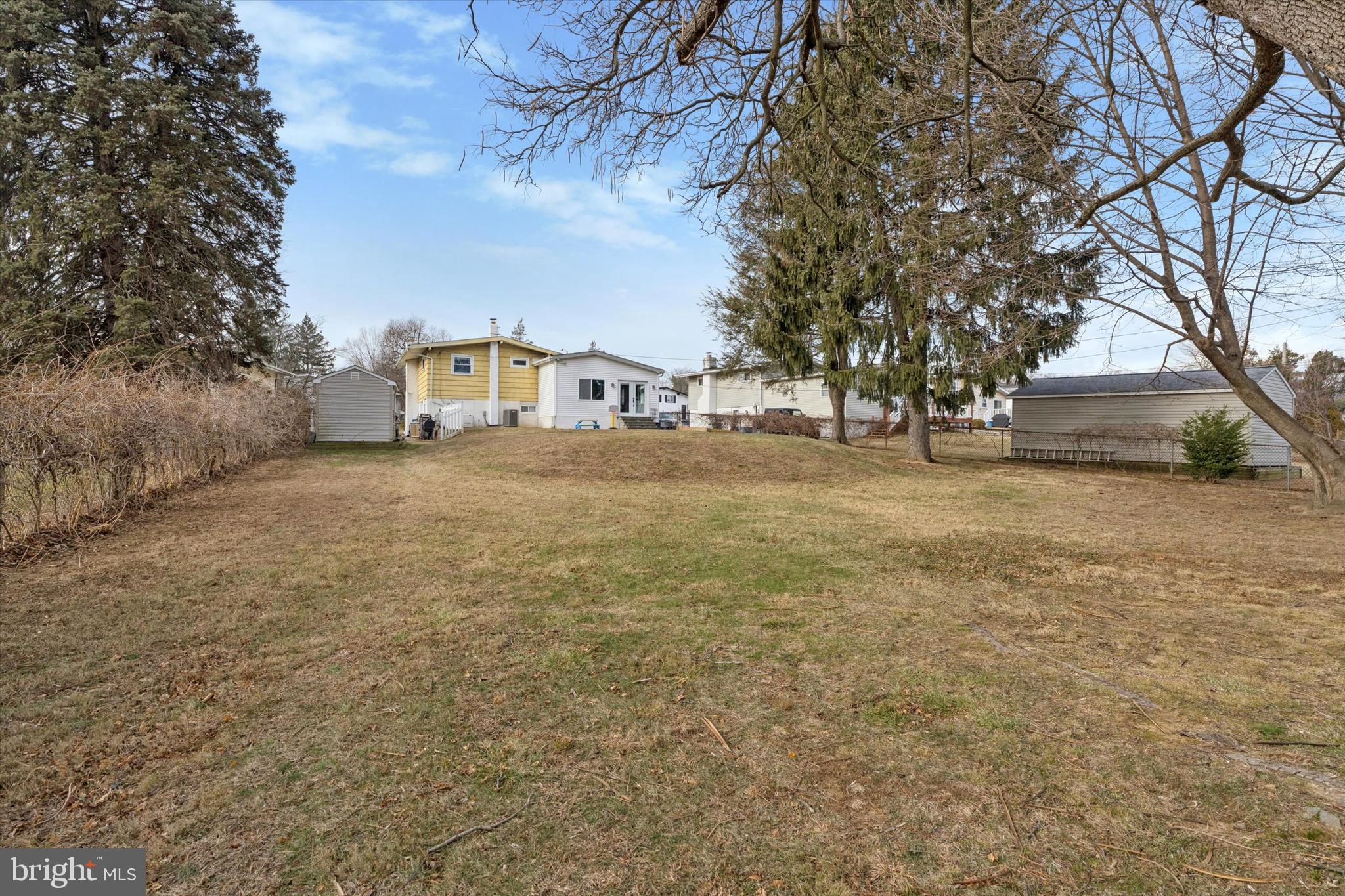 415 Milford Road Broomall, PA 19008 - Photo 25 of 29 a view of a yard with a house and a large tree
