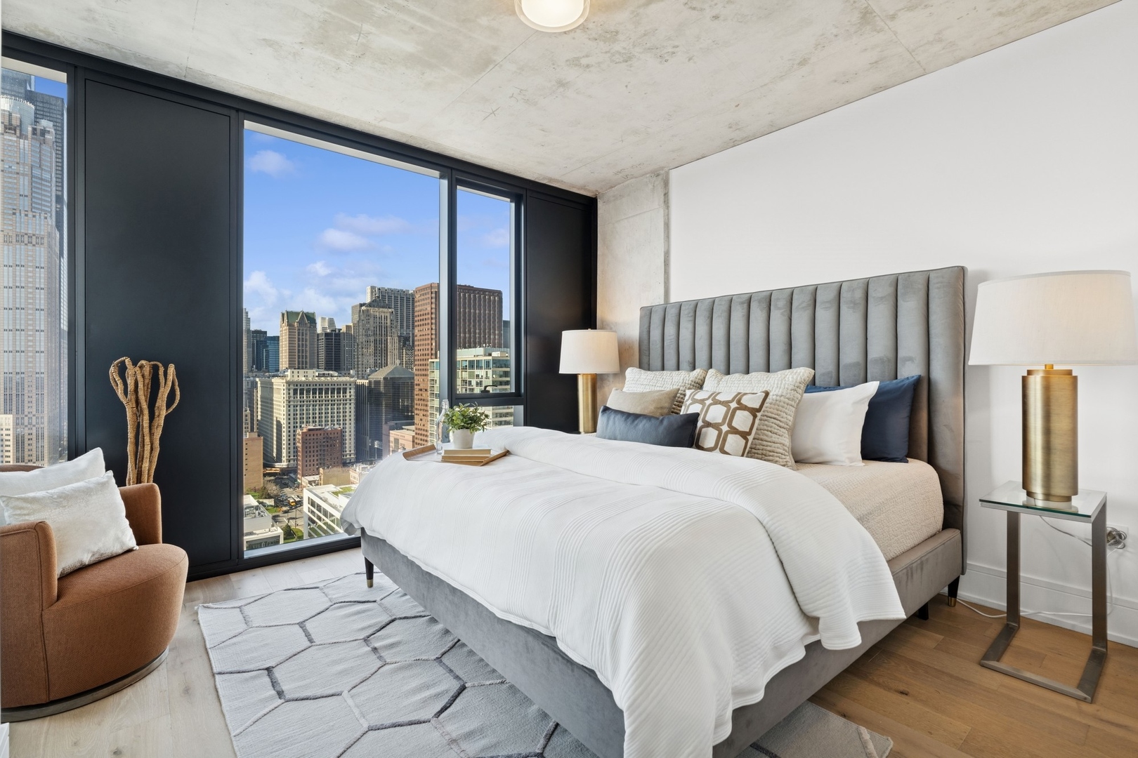 234 West Polk Street, Unit 3510 Chicago, IL 60607 - Photo 12 of 39 a bedroom with a bed and glass door