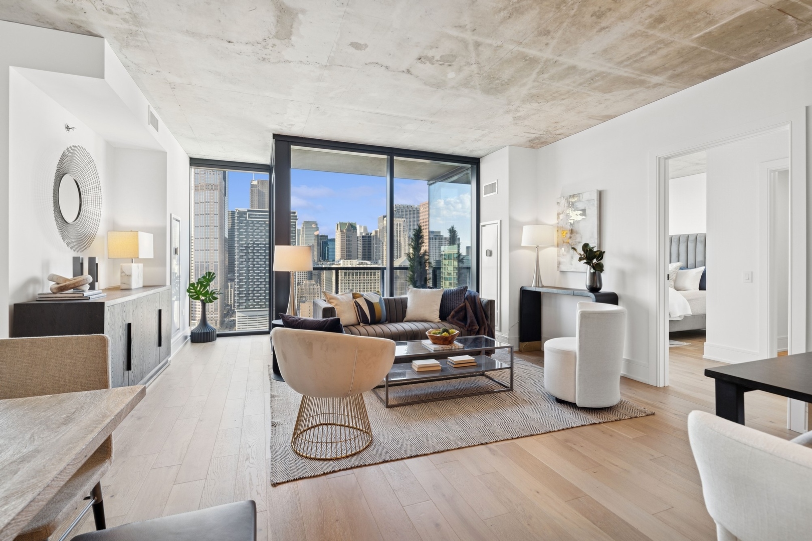 234 West Polk Street, Unit 3510 Chicago, IL 60607 - Photo 5 of 39 a living room with furniture and a large window