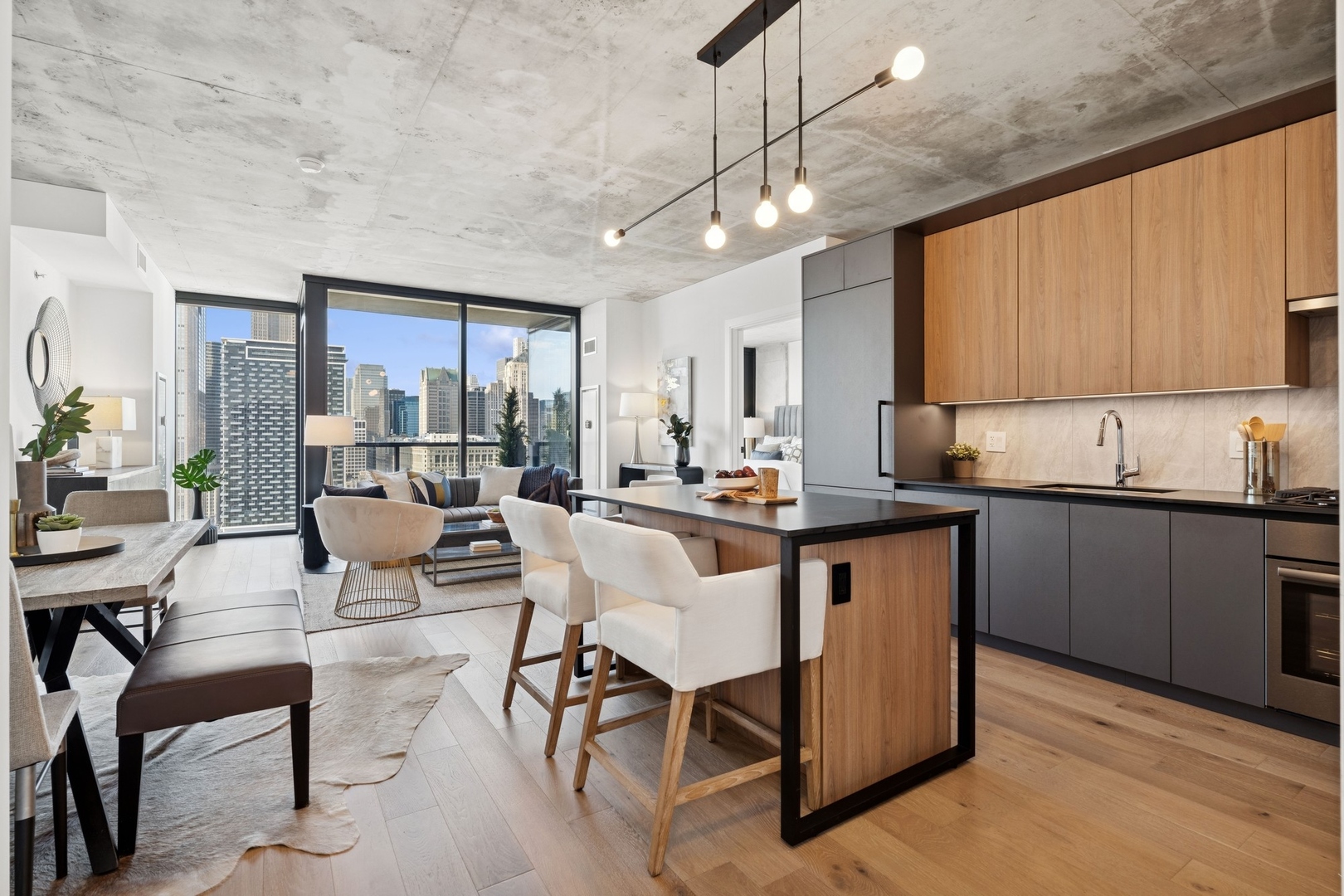 234 West Polk Street, Unit 3510 Chicago, IL 60607 - Photo 9 of 39 a kitchen with a sink cabinets and window