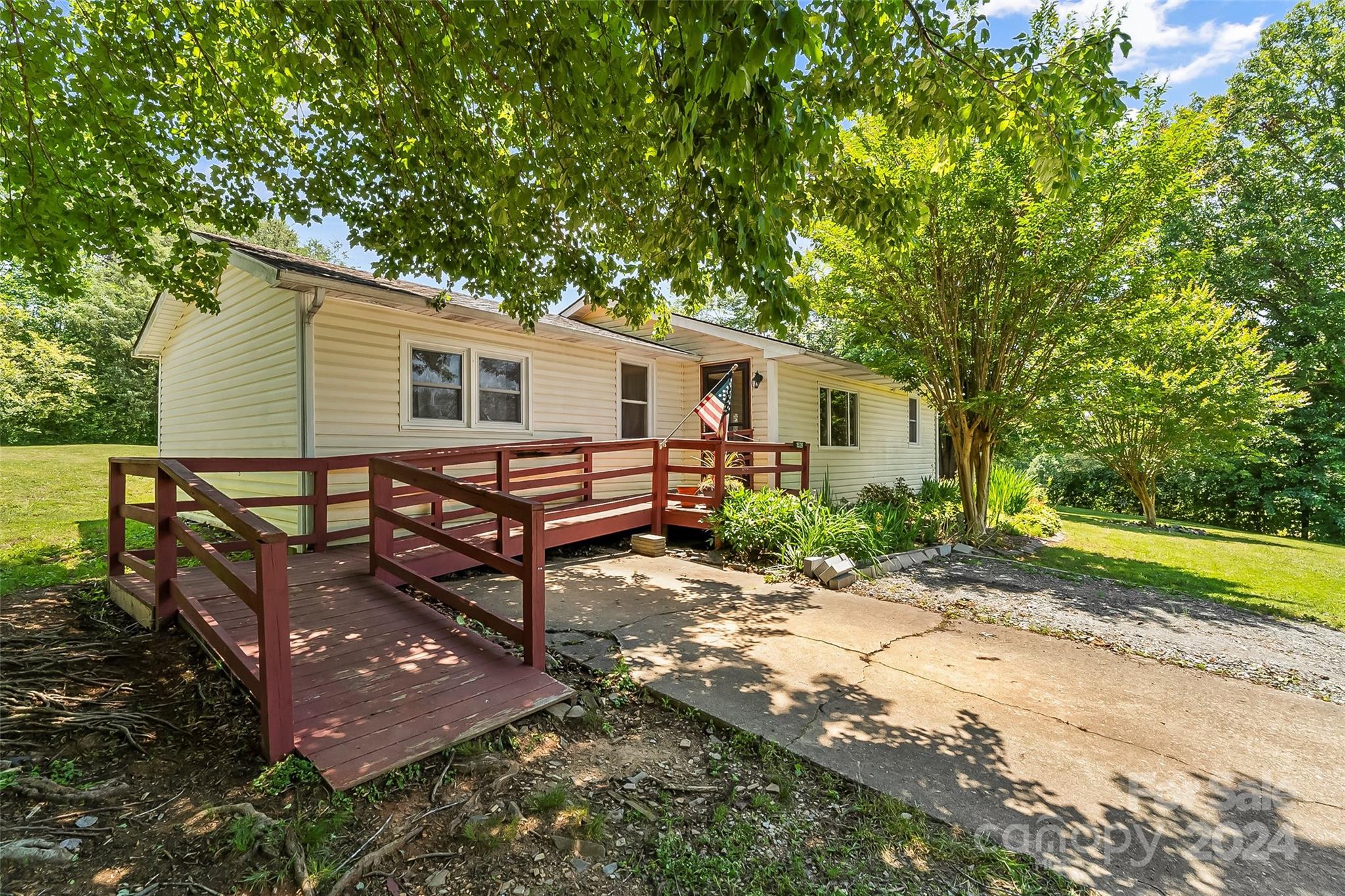 1529 Tatertown Loop Nebo, NC 28761 - Photo 2 of 38 a view of a house with backyard and sitting area