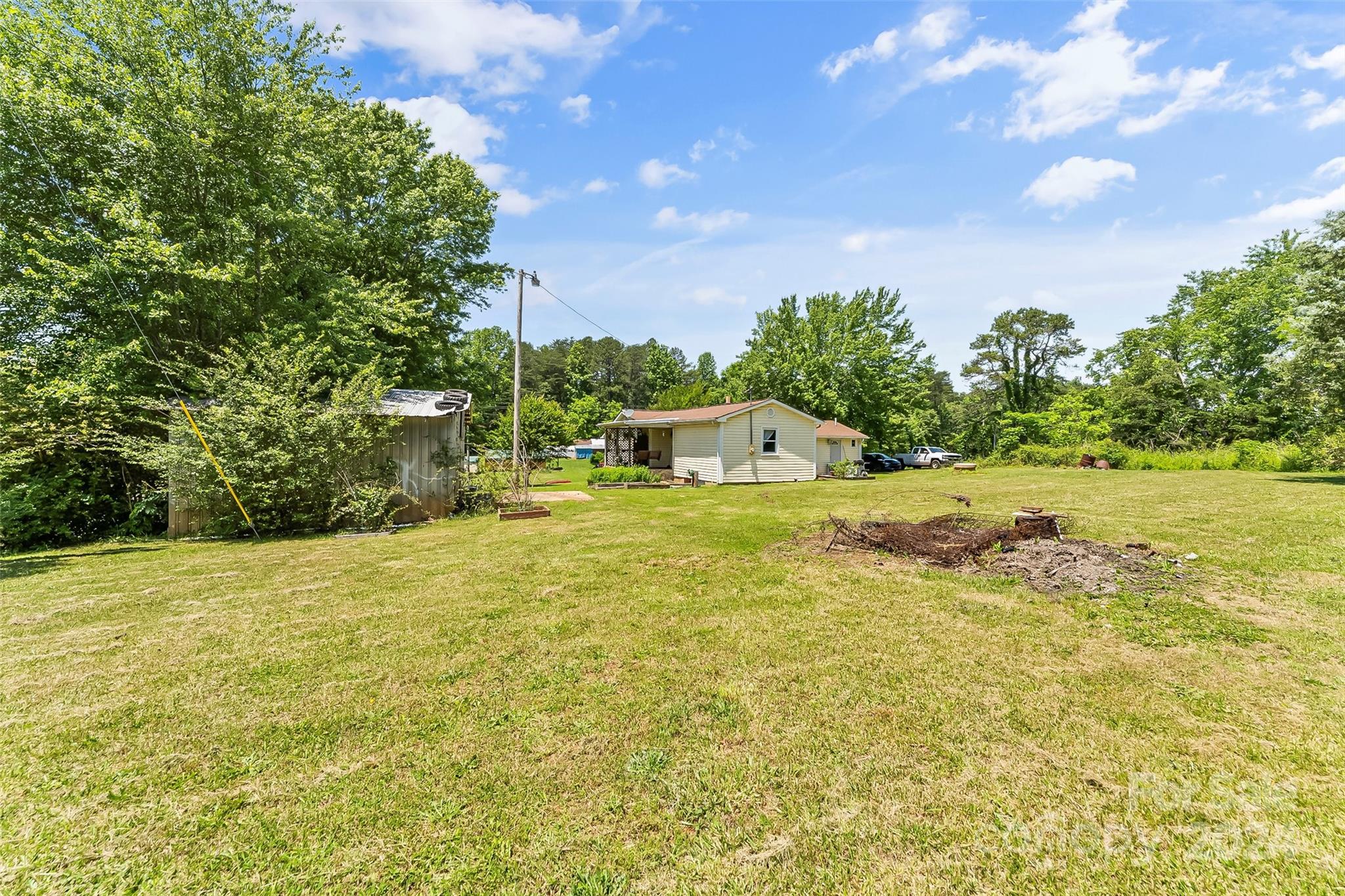 1529 Tatertown Loop Nebo, NC 28761 - Photo 21 of 38 a house with a yard