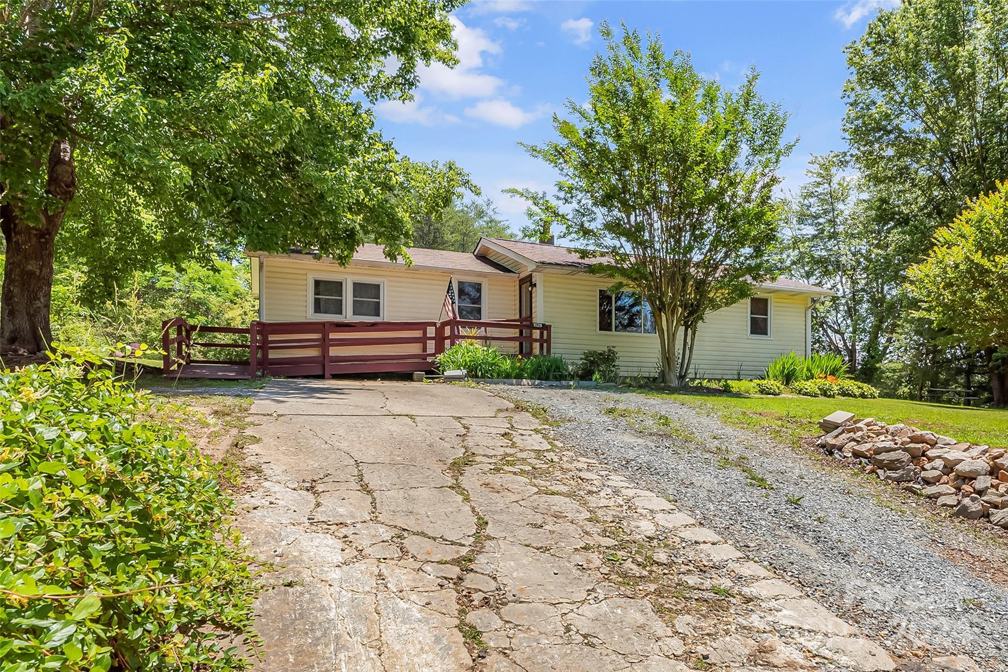 1529 Tatertown Loop Nebo, NC 28761 - Photo 24 of 38 a front view of a house with a yard