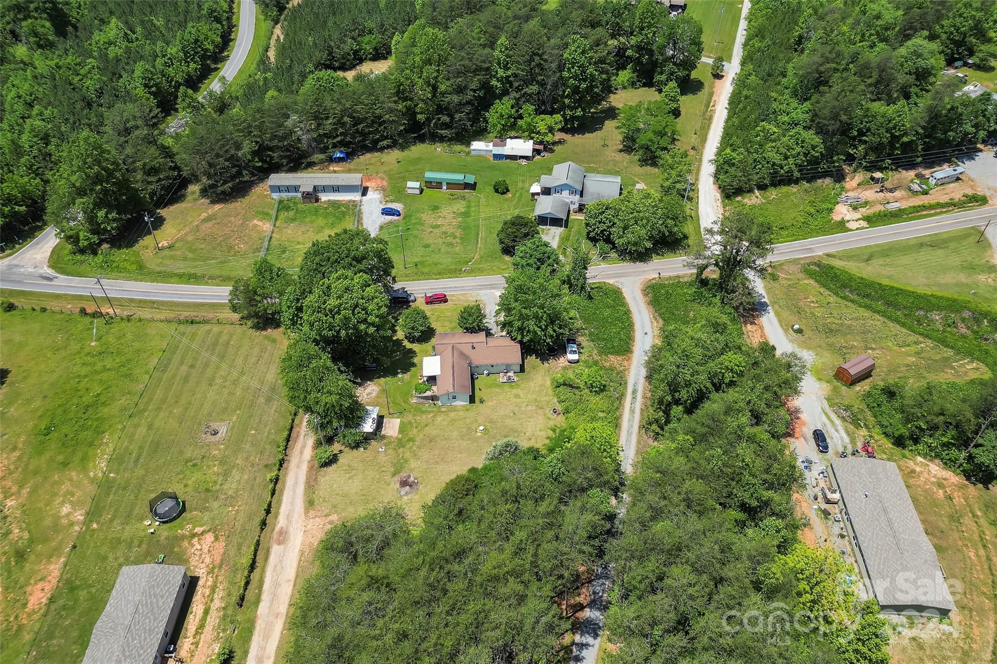 1529 Tatertown Loop Nebo, NC 28761 - Photo 26 of 38 an aerial view of a house with a yard basket ball court and outdoor seating