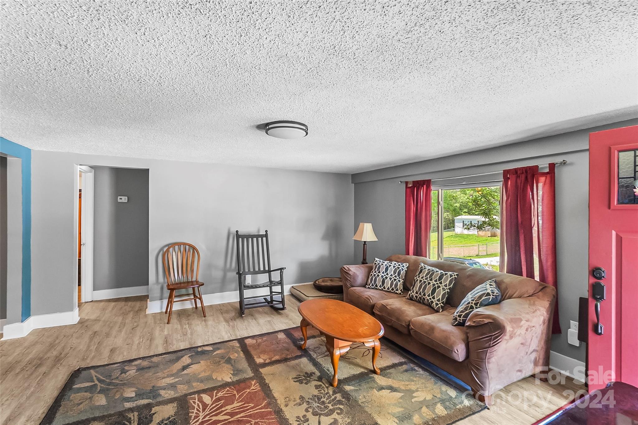 1529 Tatertown Loop Nebo, NC 28761 - Photo 4 of 38 a living room with furniture and a large window