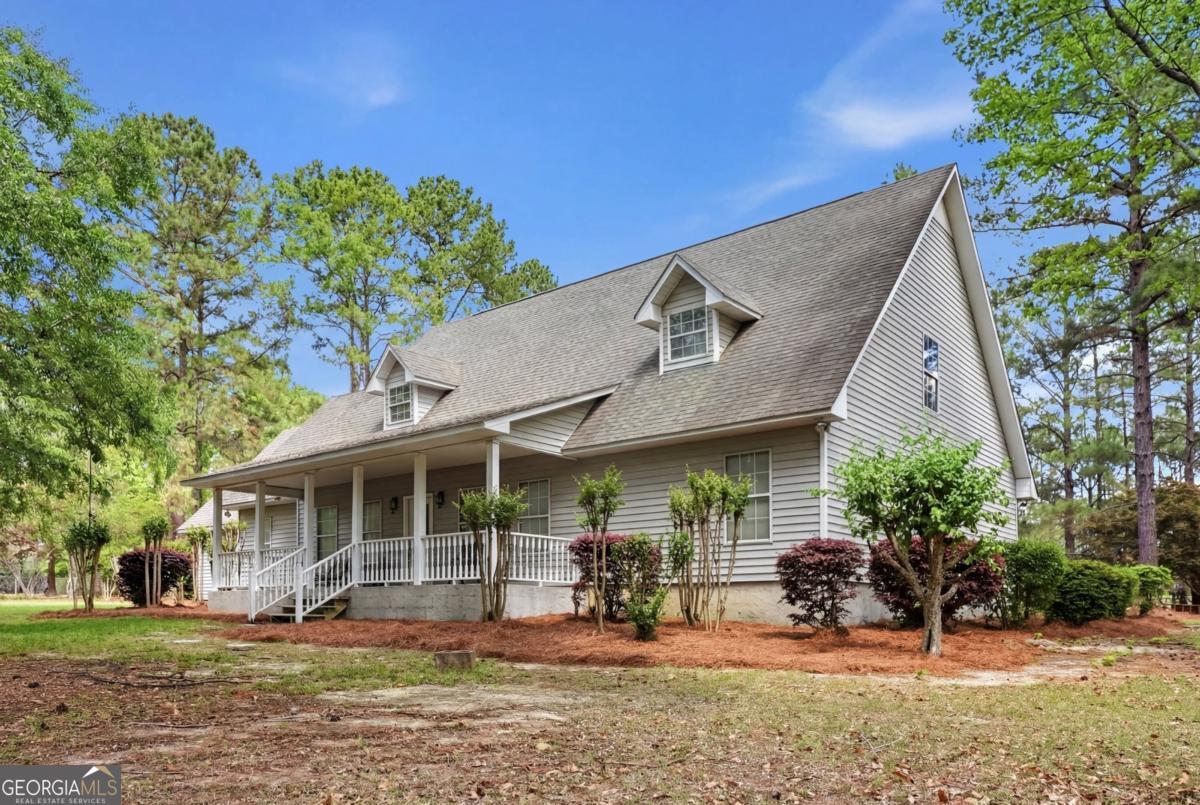 2811 Lullwater Road Tifton, GA 31794 - Photo 2 of 64 front view of a house with a patio