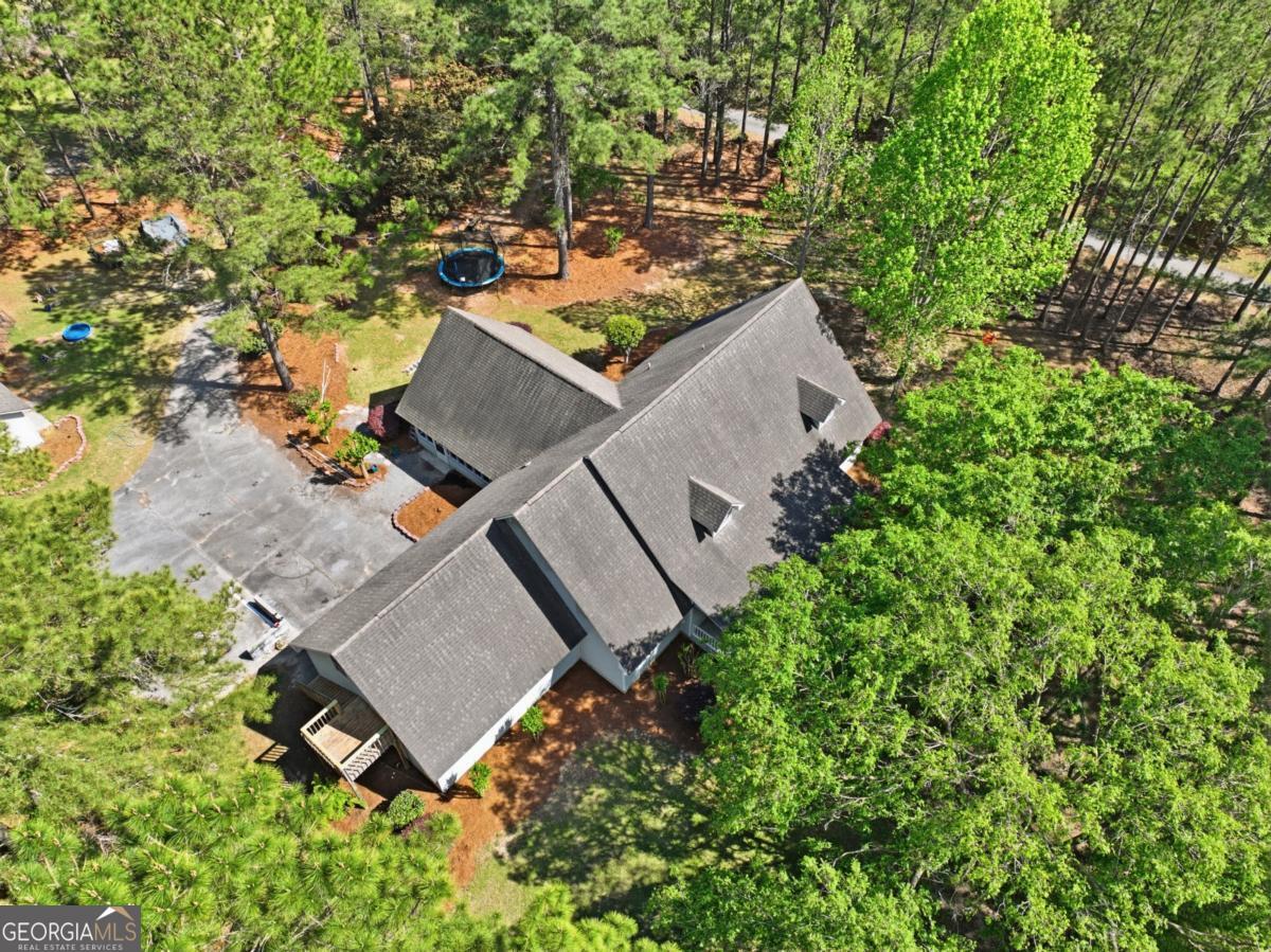 2811 Lullwater Road Tifton, GA 31794 - Photo 60 of 64 an aerial view of a house with a yard