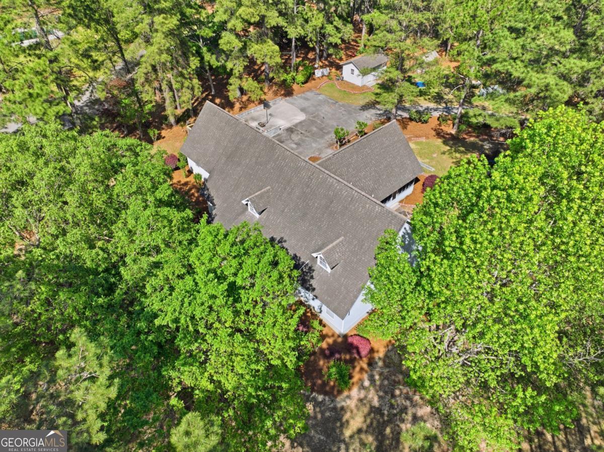 2811 Lullwater Road Tifton, GA 31794 - Photo 61 of 64 an aerial view of a house with a yard and garden