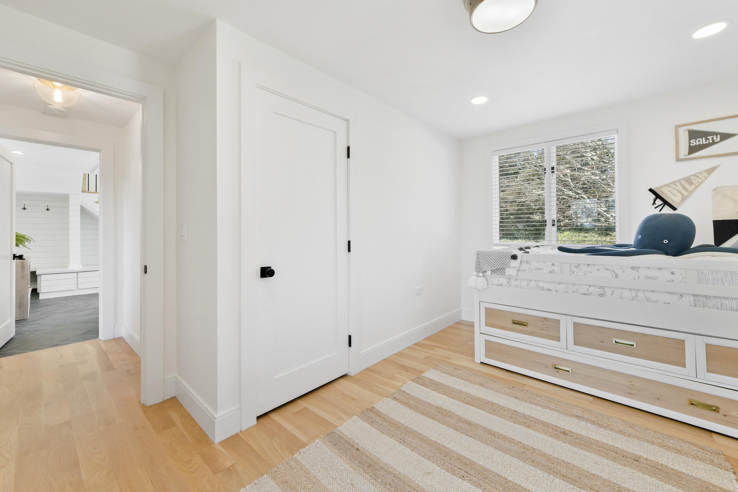 3 Harbor Road Orleans, MA 02653 - Photo 22 of 36 a spacious bedroom with a bed and a window