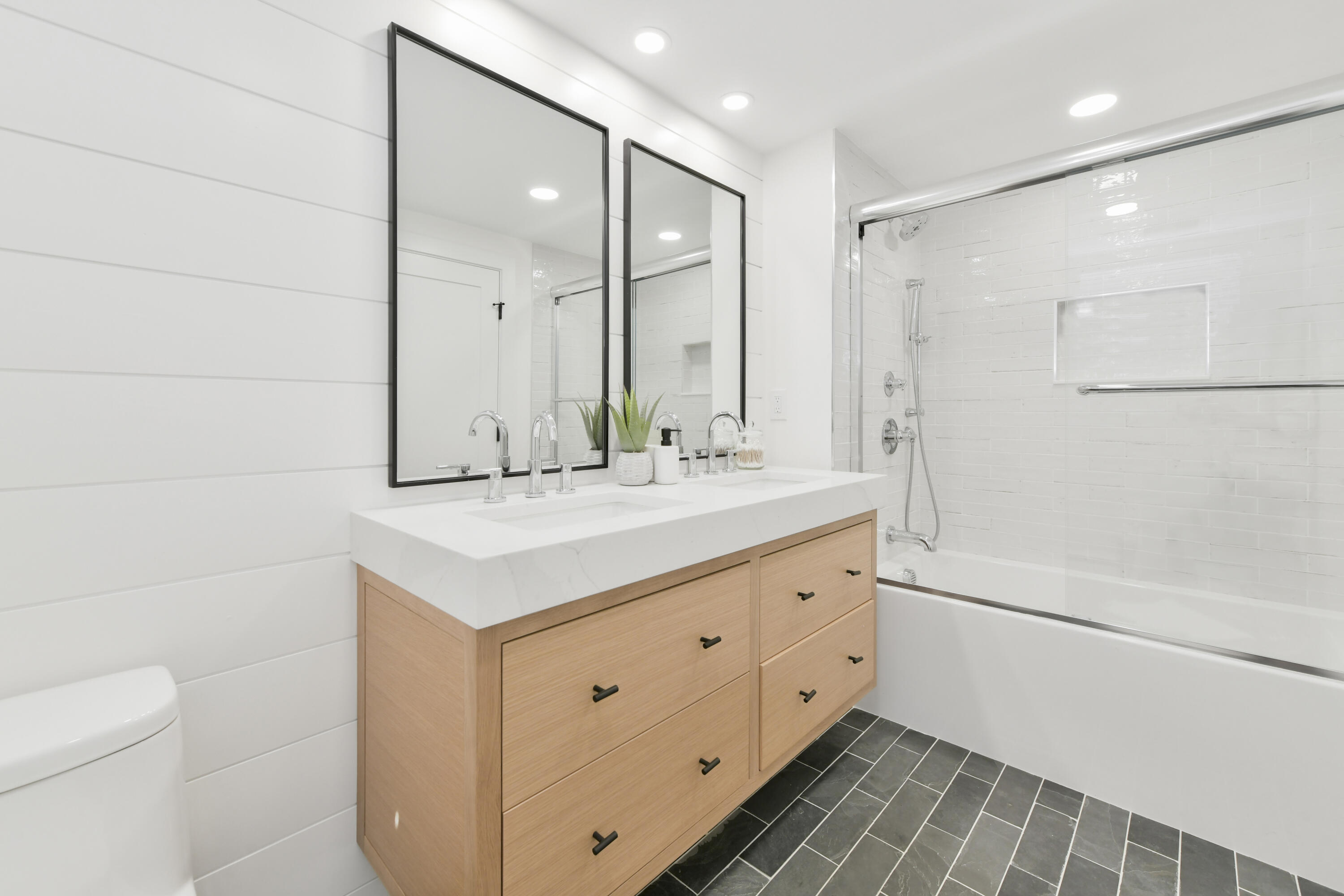 3 Harbor Road Orleans, MA 02653 - Photo 28 of 36 a bathroom with a double vanity sink mirror and shower