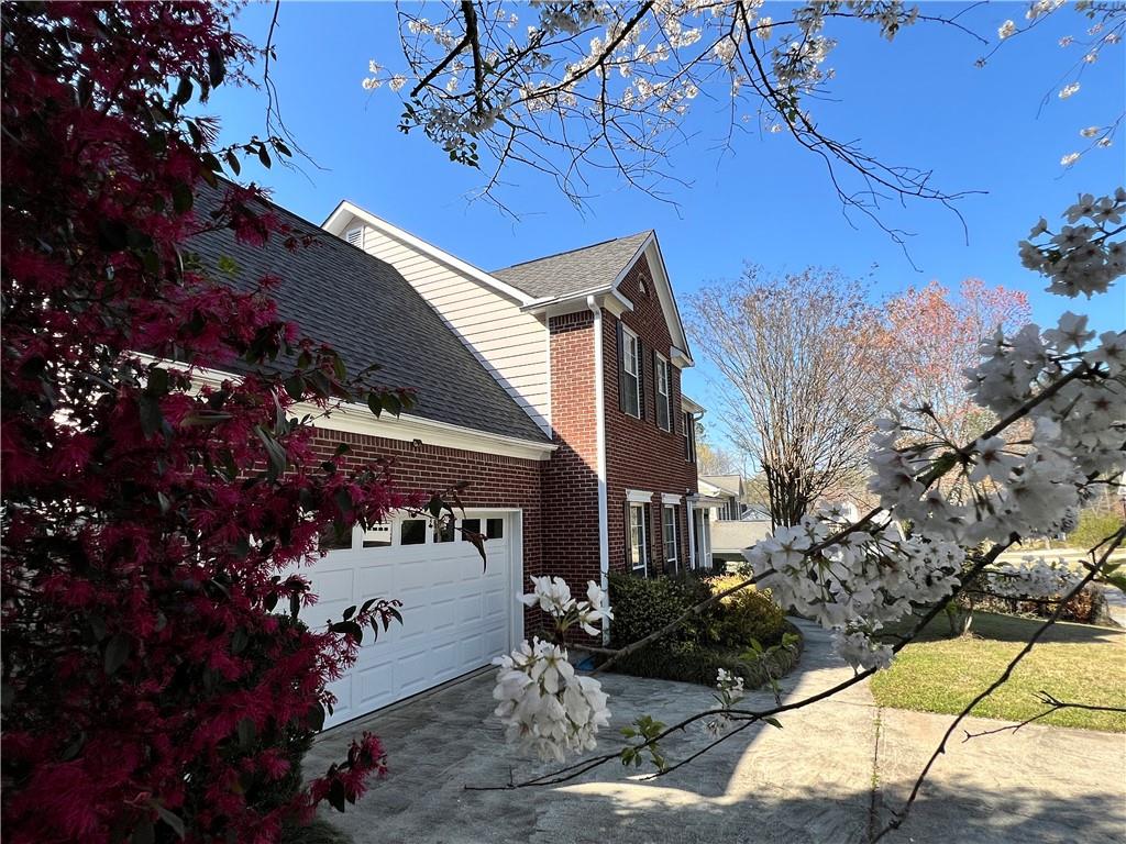 5415 Taylor Road Alpharetta, GA 30022 - Photo 24 of 29 a front view of a house with a tree