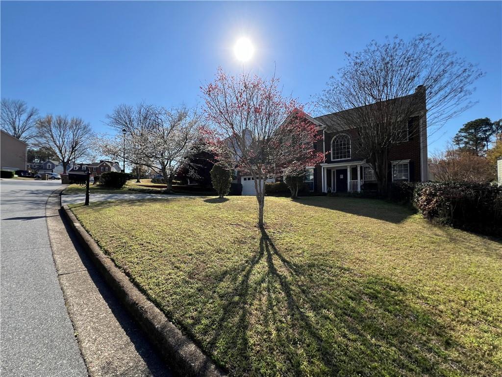5415 Taylor Road Alpharetta, GA 30022 - Photo 27 of 29 a view of a backyard with a garden