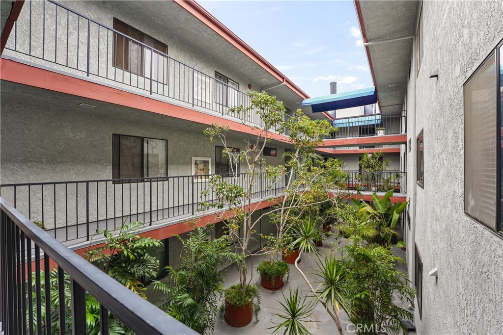 3600 East 4th Street, Unit 203 Long Beach, CA 90814 - Photo 20 of 21 view of courtyard once you exit the elevator on 2nd floor