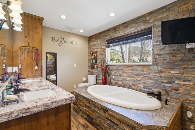 781 West 3000 South Heber City, UT 84032 - Photo 12 of 30 Full bathroom featuring double vanity and a garden tub