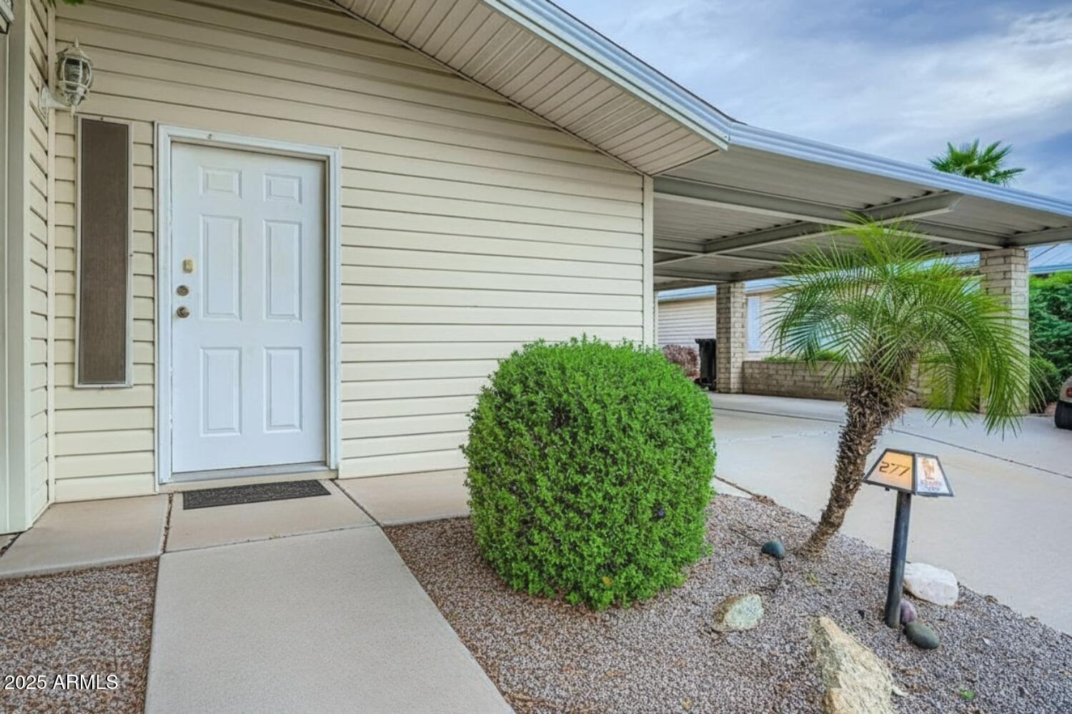 2550 South Ellsworth Road, Unit 277 Mesa, AZ 85209 - Photo 2 of 20 a view of a backyard