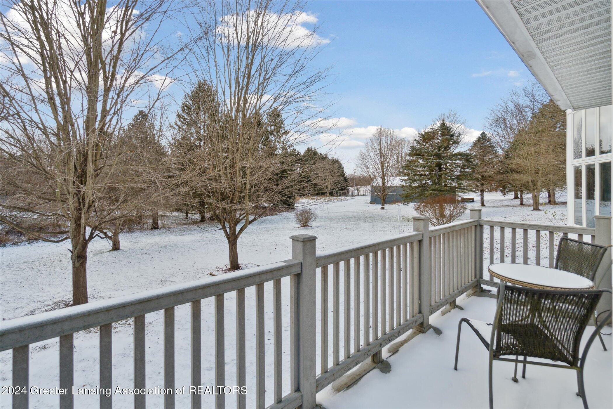 14725 Nichols Road Bath, MI 48808 - Photo 40 of 53 Side deck off family room