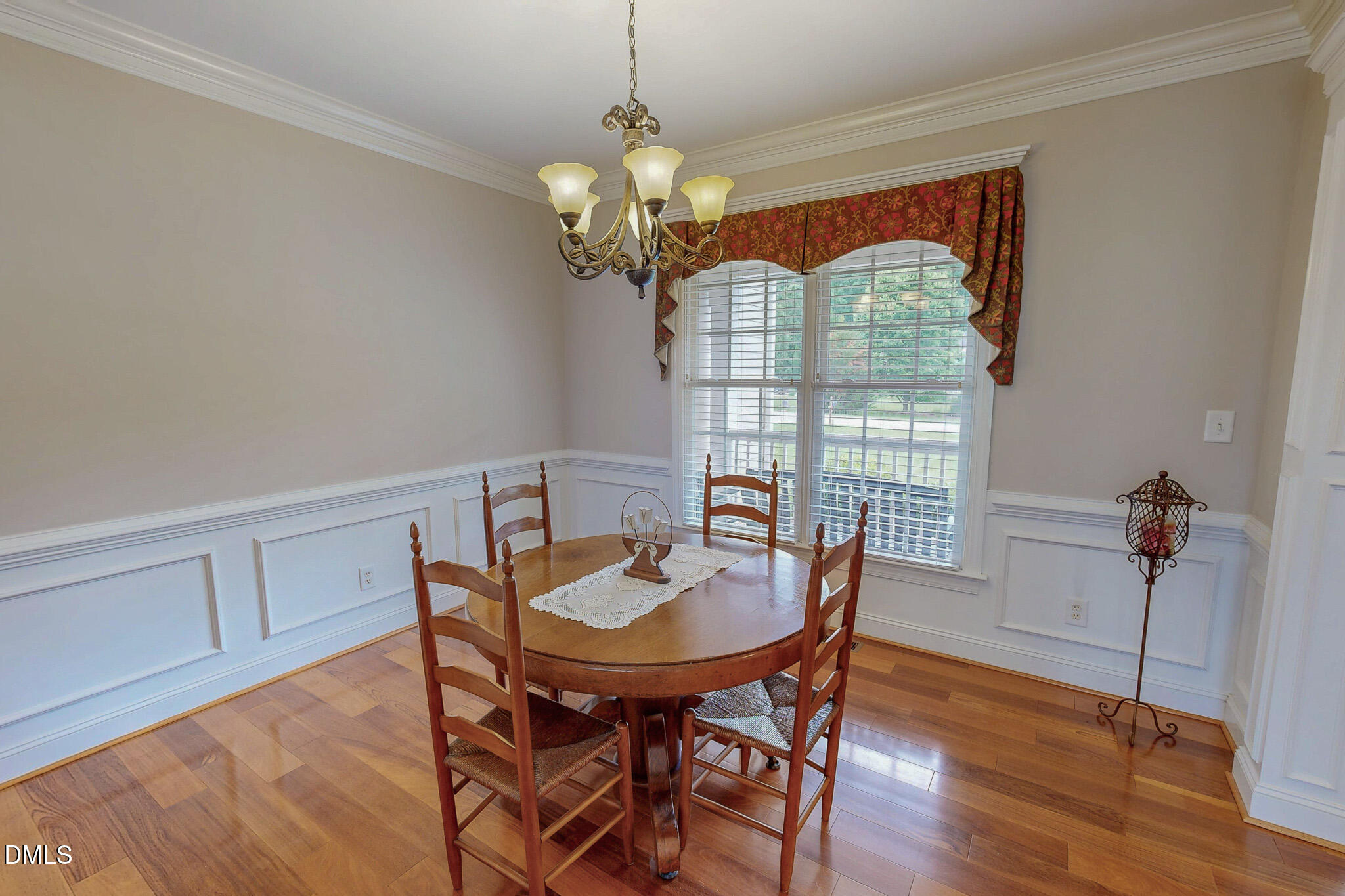 115 Duncan Plantation Road Timberlake, NC 27583 - Photo 23 of 48 a dining room with furniture a chandelier and wooden floor