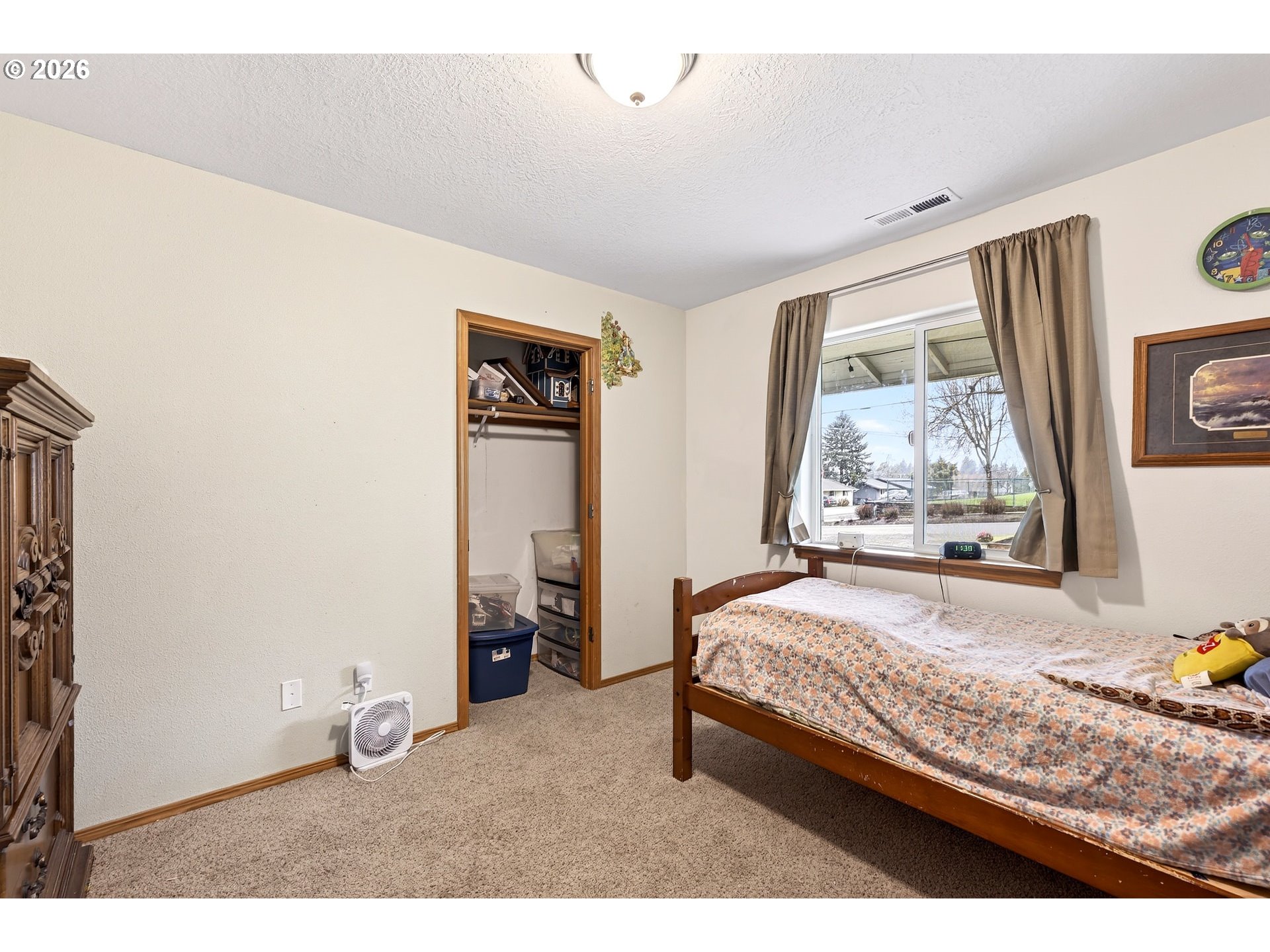 720 Market Street Lafayette, OR 97127 - Photo 20 of 35 a bedroom with a bed and window