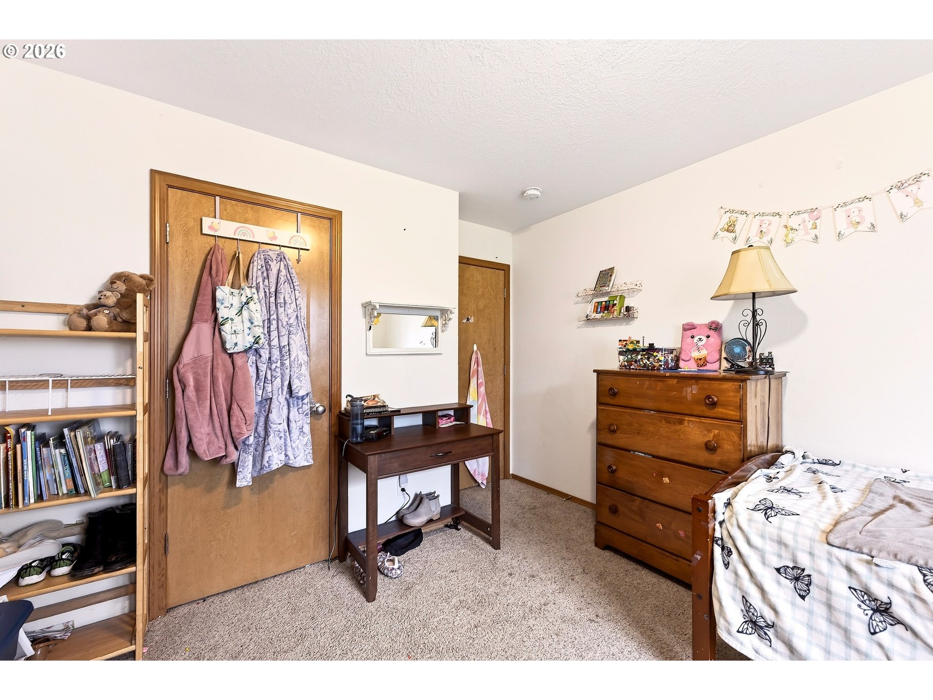 720 Market Street Lafayette, OR 97127 - Photo 22 of 35 a bedroom with a bed and furniture