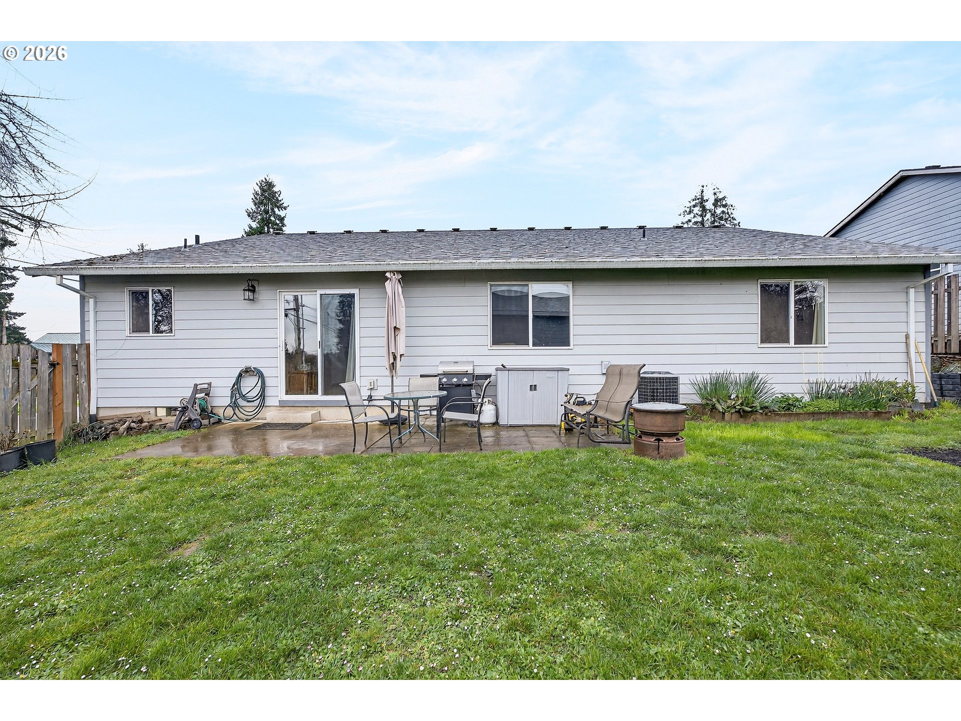 720 Market Street Lafayette, OR 97127 - Photo 25 of 35 a view of a house with backyard and a garden