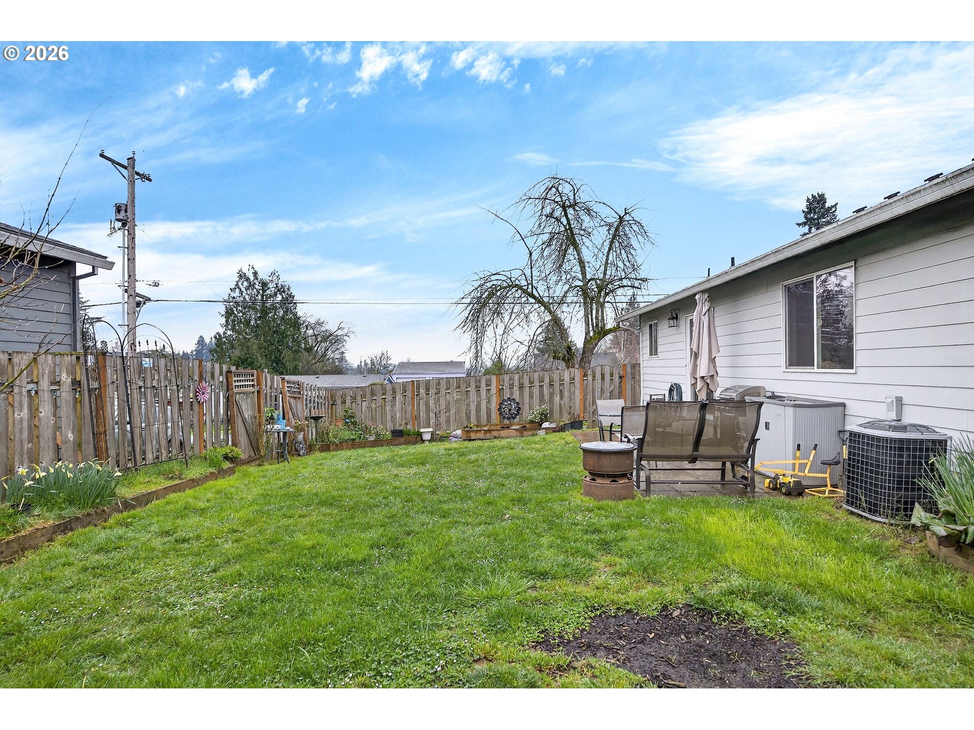720 Market Street Lafayette, OR 97127 - Photo 29 of 35 a backyard of a house with table and chairs