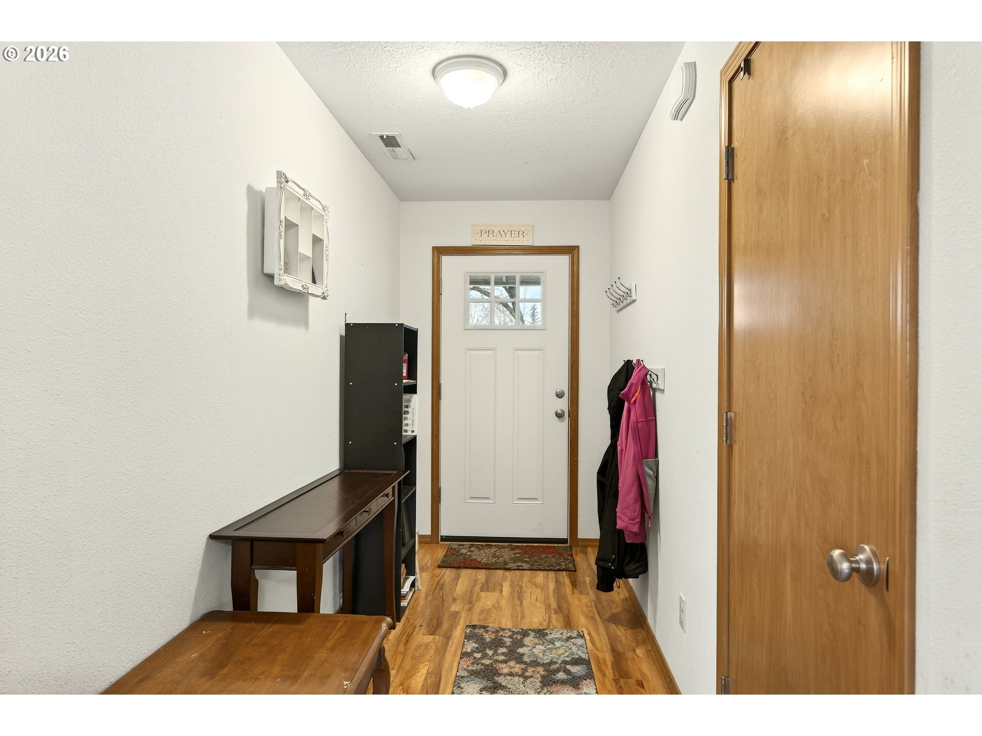 720 Market Street Lafayette, OR 97127 - Photo 5 of 35 a view of an entryway with wooden floor