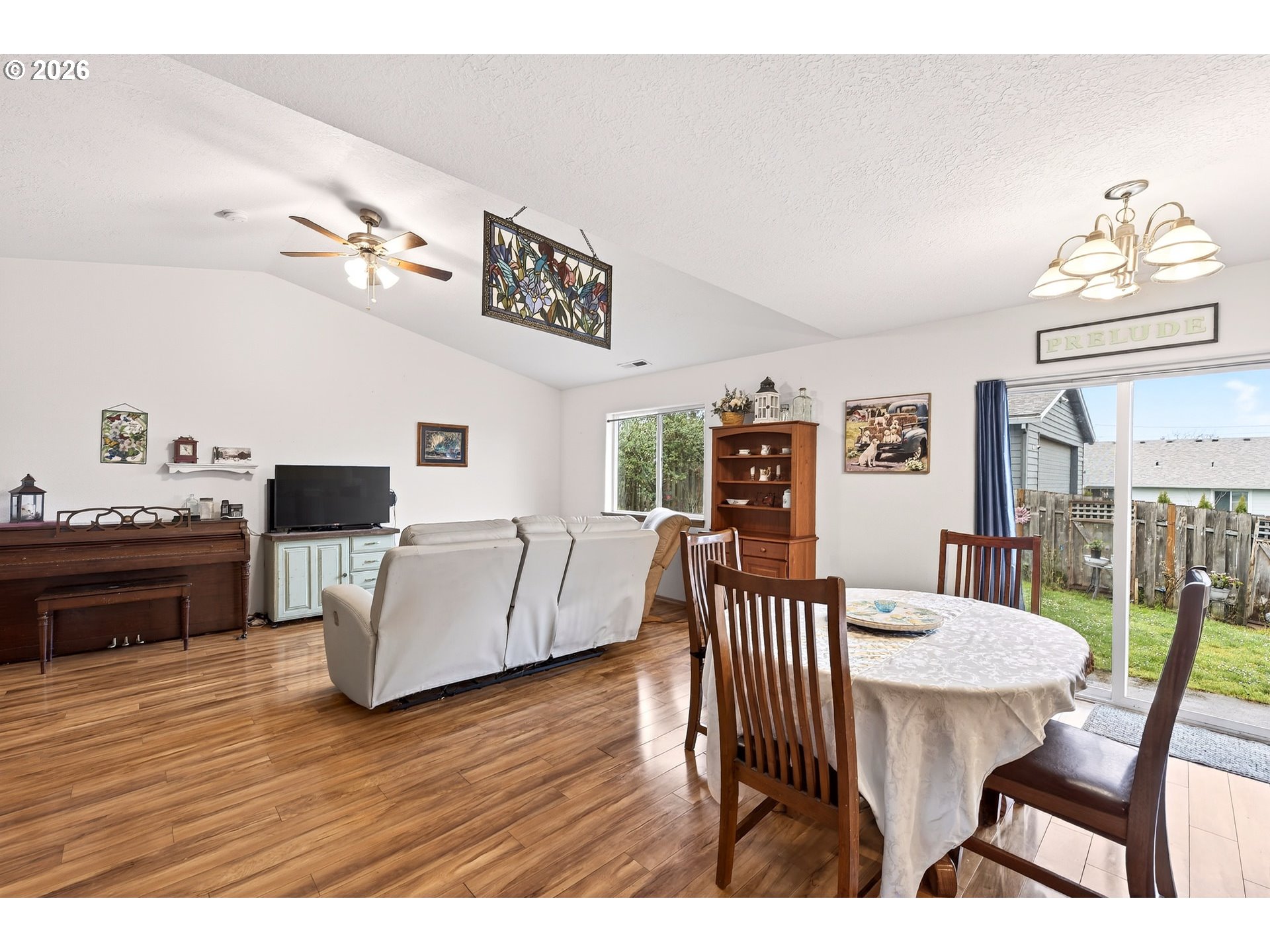 720 Market Street Lafayette, OR 97127 - Photo 8 of 35 a view of a dining room with furniture and wooden floor