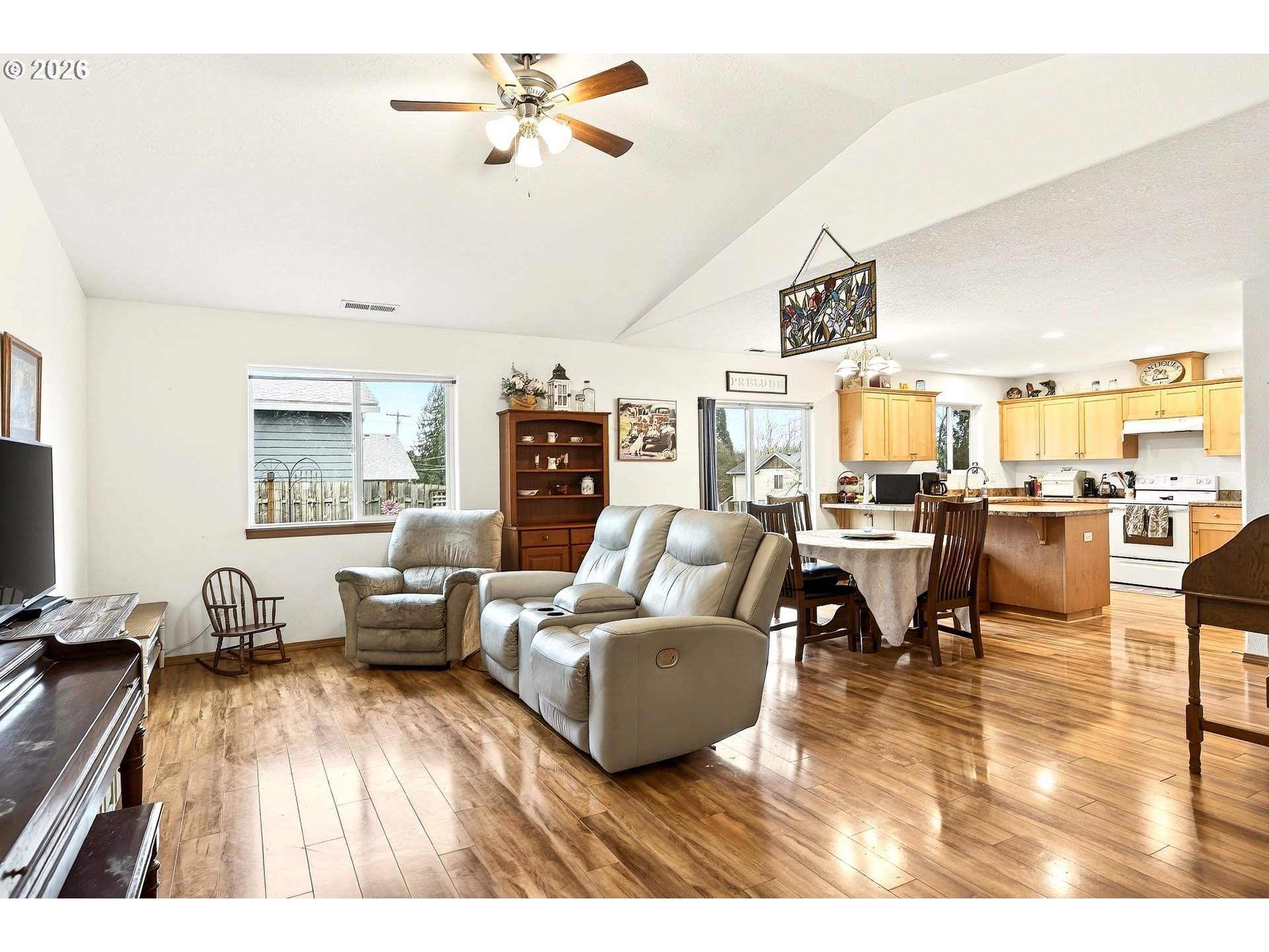 720 Market Street Lafayette, OR 97127 - Photo 9 of 35 a living room with furniture and a flat screen tv