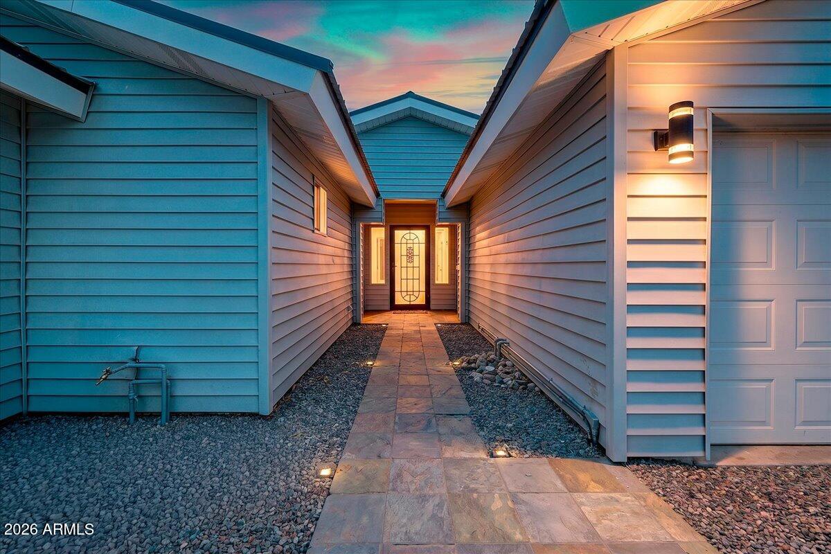 7624 North Citrus Road Waddell, AZ 85355 - Photo 6 of 57 a view of a house with a yard
