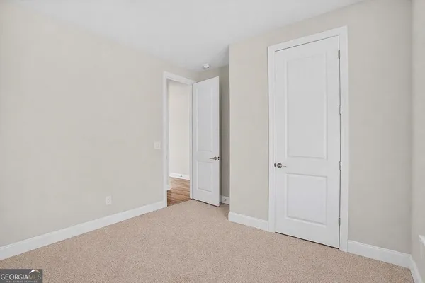 a view of a house with a yard porch and sitting area