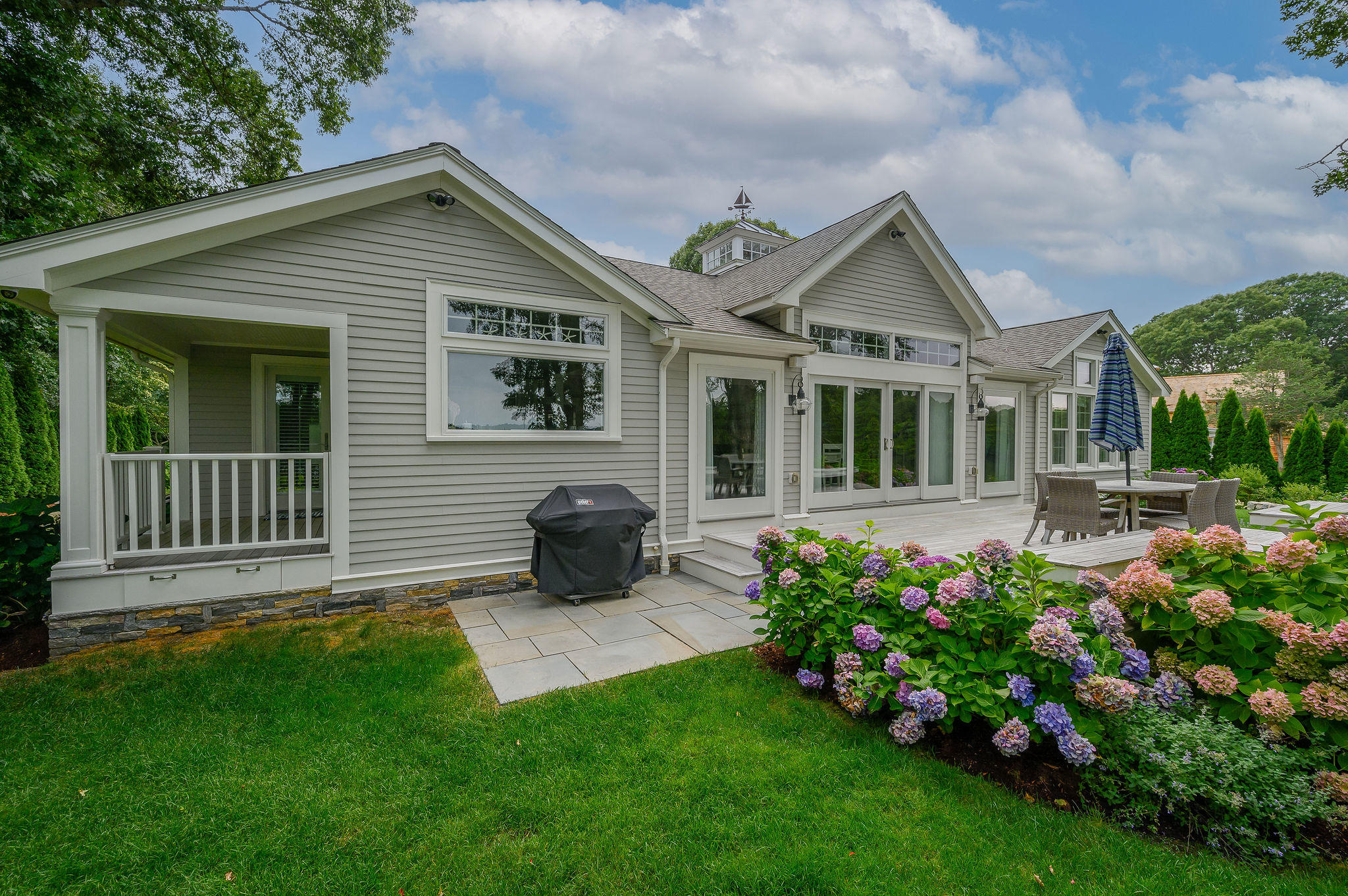 256 Holly Point Road Centerville, MA 02632 - Photo 36 of 53 a view of a house with a garden