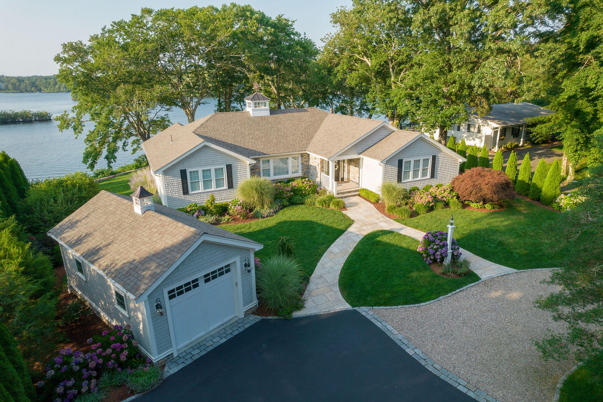 256 Holly Point Road Centerville, MA 02632 - Photo 8 of 53 an aerial view of a house with a yard and street