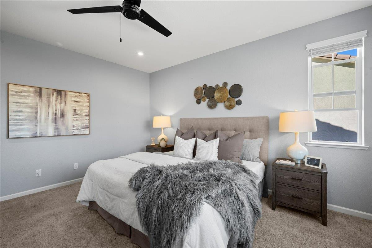 4828 Aldridge Ravine Court Folsom, CA 95630 - Photo 22 of 43 a bedroom with a bed and window