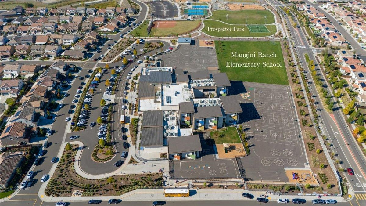 4828 Aldridge Ravine Court Folsom, CA 95630 - Photo 40 of 43 an aerial view of a house with a swimming pool
