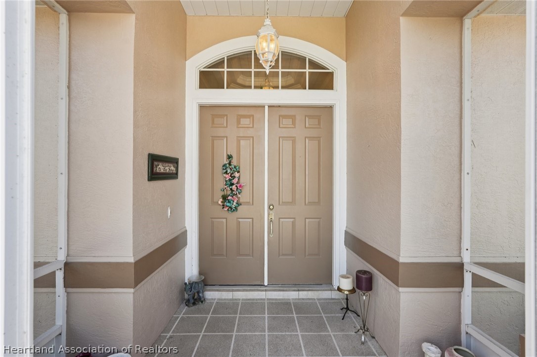107 Orange Road Northeast Lake Placid, FL 33852 - Photo 4 of 47 Front Porch / Entrance