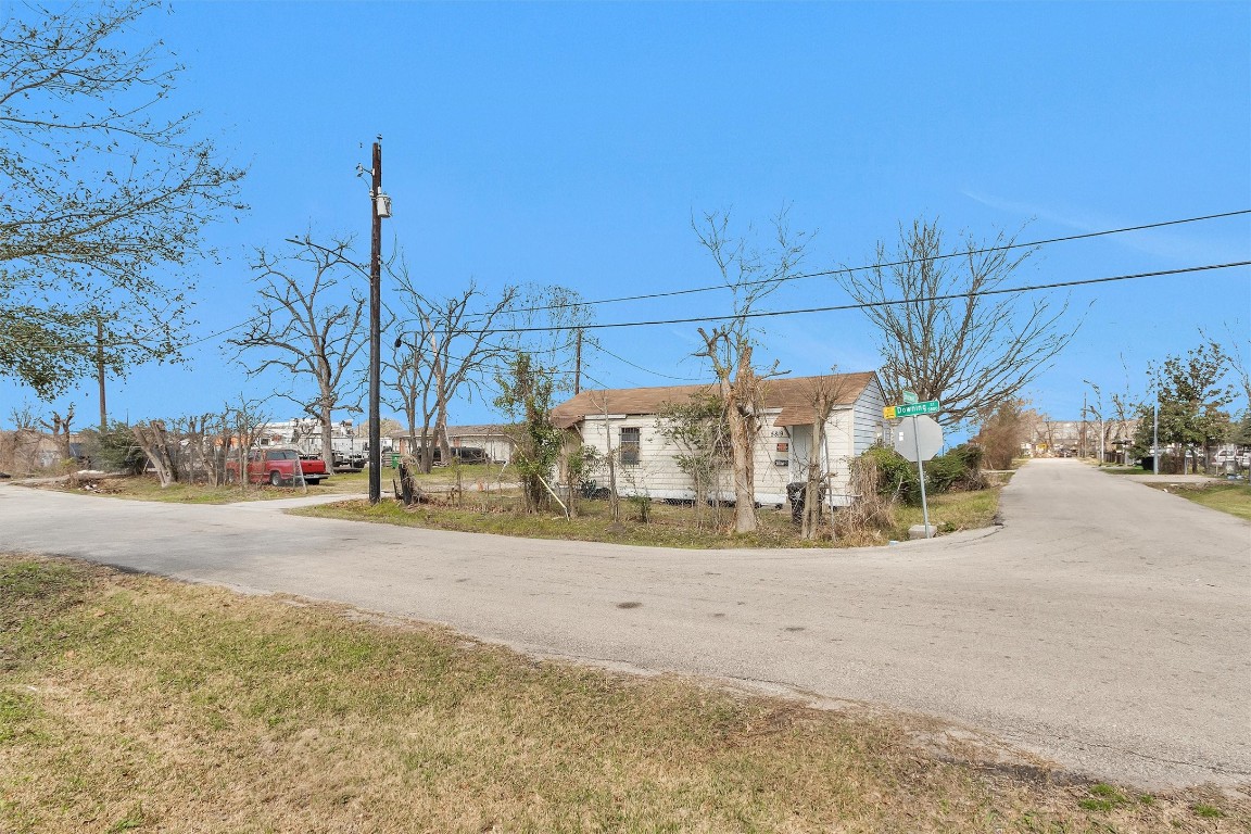 5817 Downing Street Houston, TX 77020 - Photo 6 of 10 a view of street with large trees