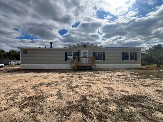 a front view of house with yard
