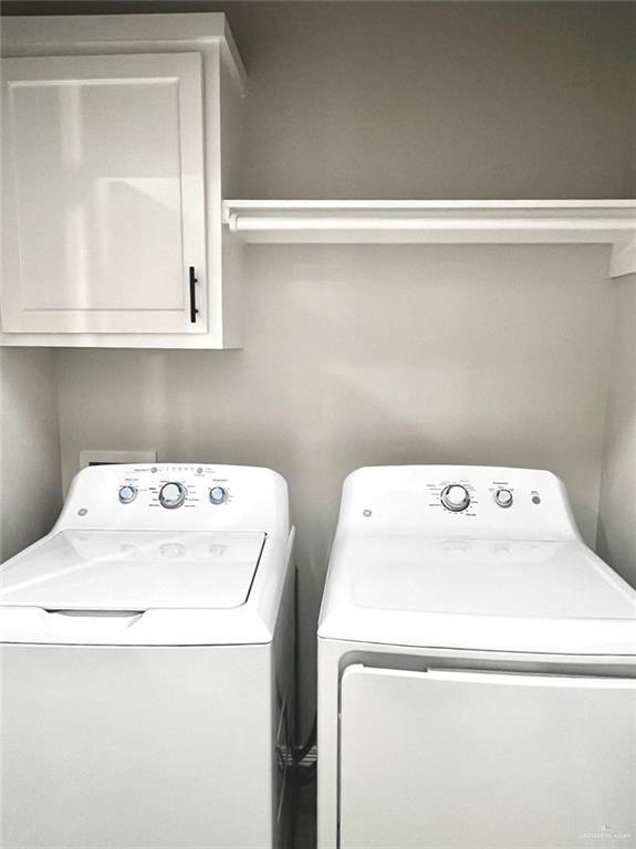 1635 Playa Drive, Unit 2 Weslaco, TX 78596 - Photo 11 of 17 a utility room with dryer and washer