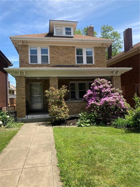 6492 Monitor Street Pittsburgh, PA 15217 - Photo 1 of 42 a front view of a house with garden