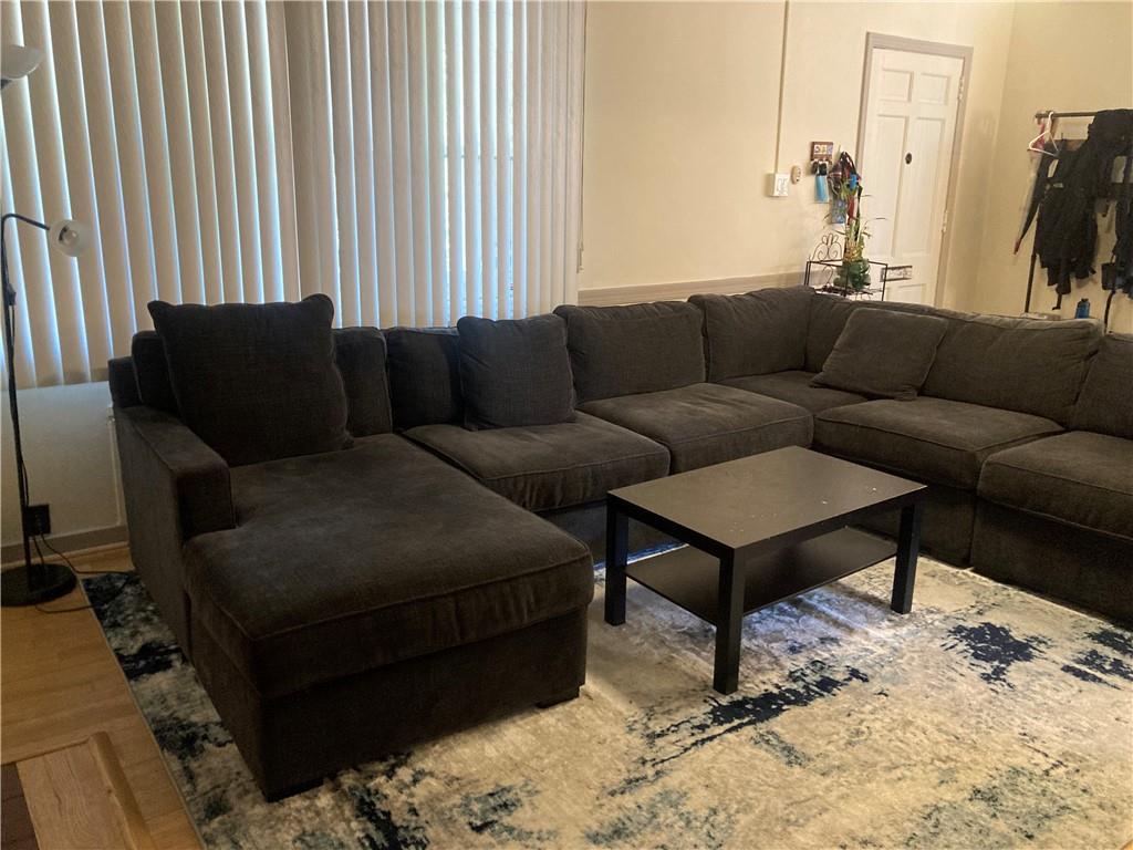 6492 Monitor Street Pittsburgh, PA 15217 - Photo 5 of 42 a living room with furniture and a rug