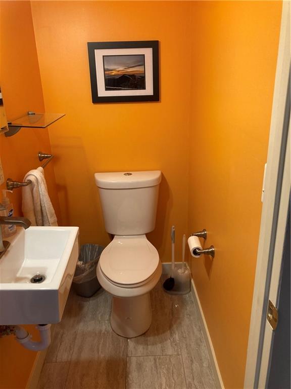 6492 Monitor Street Pittsburgh, PA 15217 - Photo 9 of 42 a bathroom with a sink and a toilet