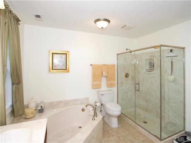 4301 Hickory Ridge Drive Raleigh, NC 27609 - Photo 15 of 25 The sellers did not spare expense when they designed this new master bathroom! Master Bath/Spa