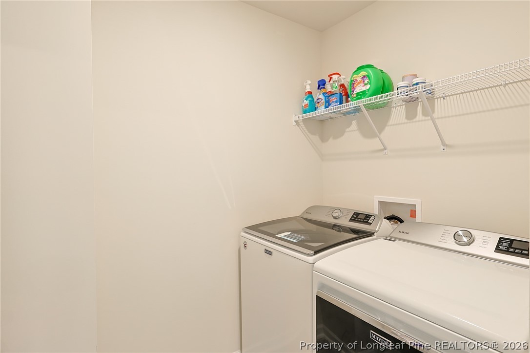 2129 Clydesmill Road Fayetteville, NC 28314 - Photo 14 of 36 a utility room with dryer and washer