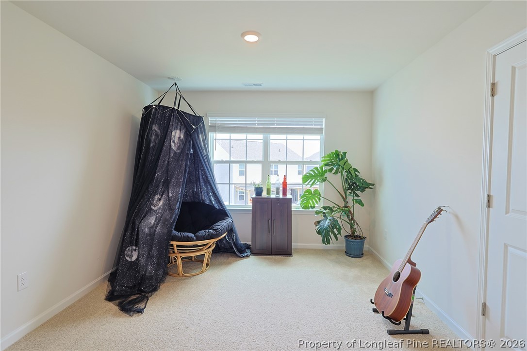 2129 Clydesmill Road Fayetteville, NC 28314 - Photo 24 of 36 a living room with furniture and a window