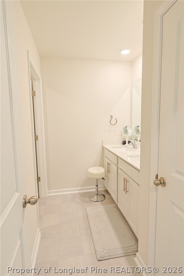 2129 Clydesmill Road Fayetteville, NC 28314 - Photo 26 of 36 a bathroom with a sink a toilet and shower