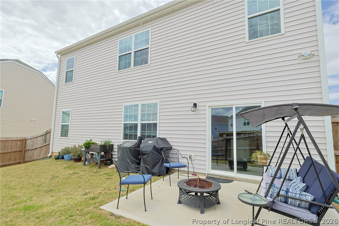 2129 Clydesmill Road Fayetteville, NC 28314 - Photo 32 of 36 a view of backyard of a house with seating space