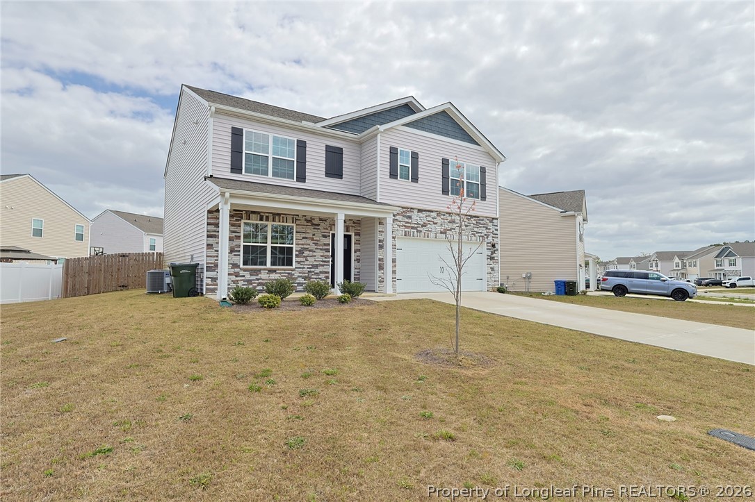 2129 Clydesmill Road Fayetteville, NC 28314 - Photo 36 of 36 a view of a house with a patio